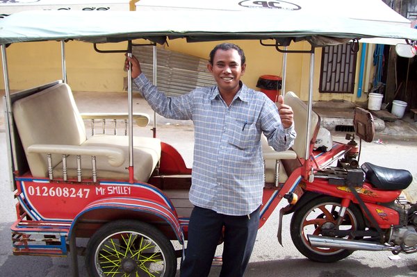 Mr.Smiley and his tuc-tuc