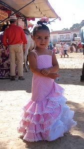 A little cutie in her pink dress