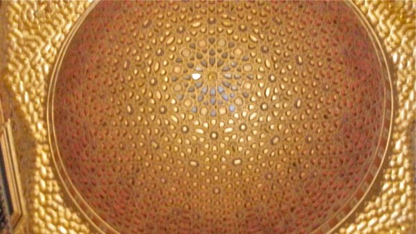 The grand gold ceiling in the throne room