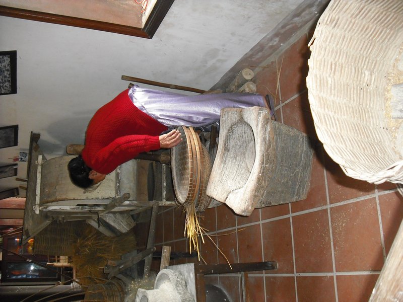 Woman making rice & flour (2)