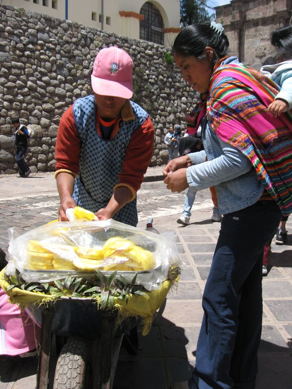 Cusco - Selling Sliced Pineapple