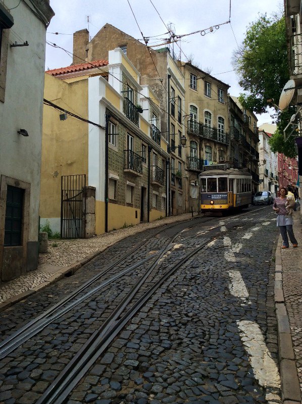 The tram winding up and down the streets of the Alfama