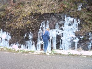 Touching a frozen waterfall