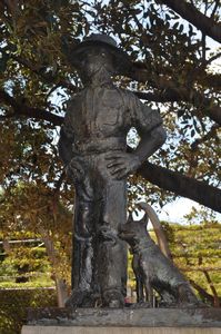 56. A statue of an Aussie with his faithful heeler.