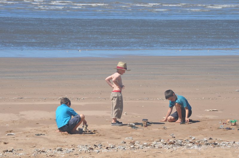 3. The boys playing at Balgal Beach