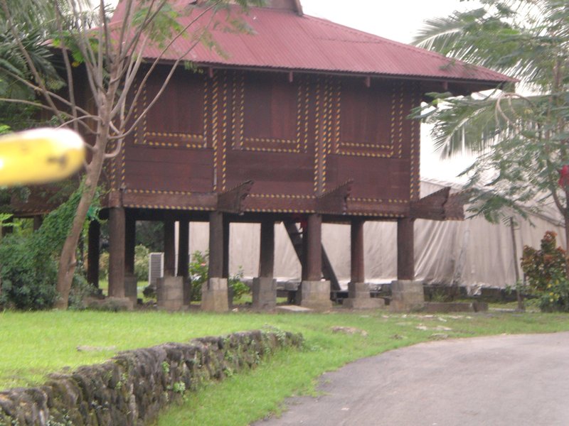One of the houses in a park that showed different traditional houses