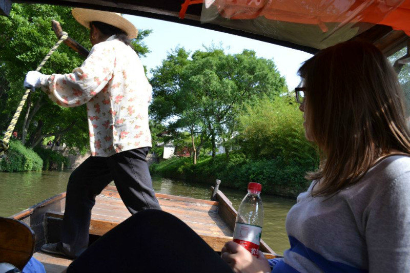 Riding a river boat in Suzhou