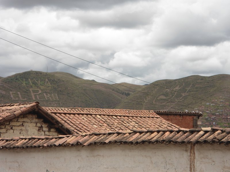 Cuzco hills beyond rooftop