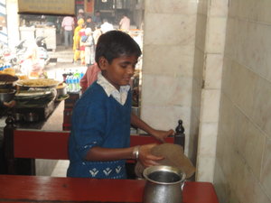 10 year old kid working in a restaurant