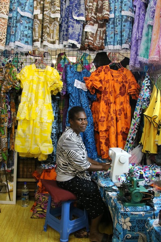 Dressmaker in the market