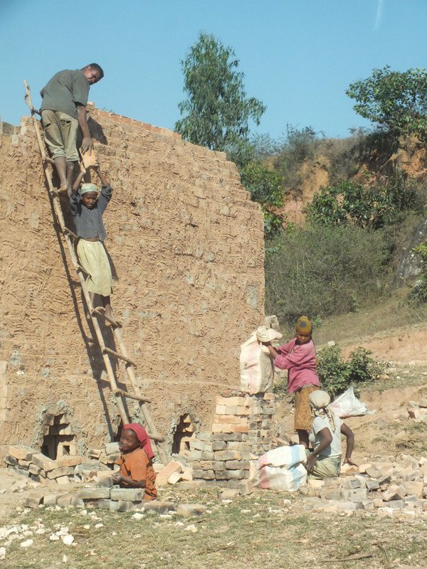 Bricks being stacked for firing