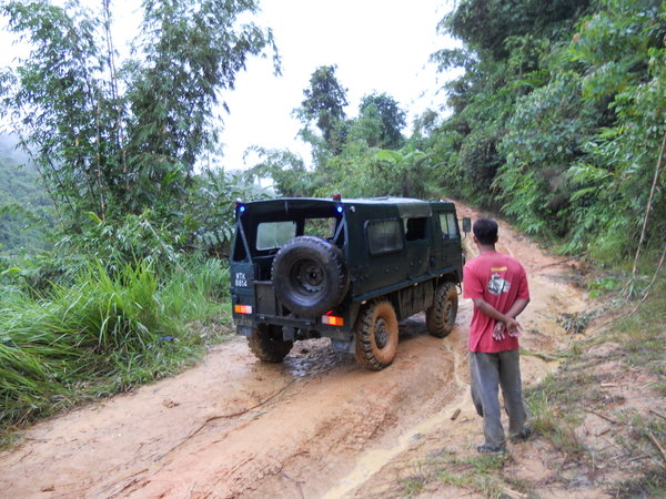 Our jungle truck getting bogged down in the mud in the Rainforest