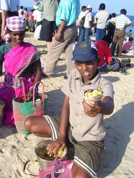 A boy with his snack bucket - Marina Beach