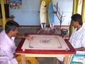 The game of carrom at a local restaurant - Arugamy Bay