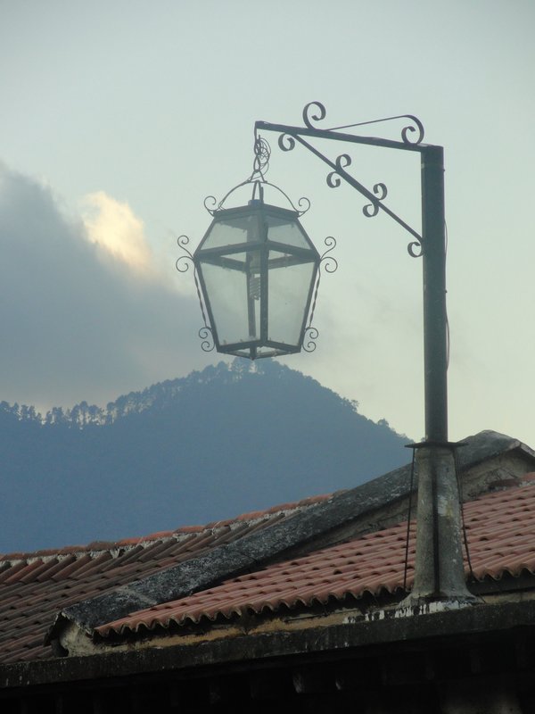 Street lamp in Antigua with Volcan Agua in the background