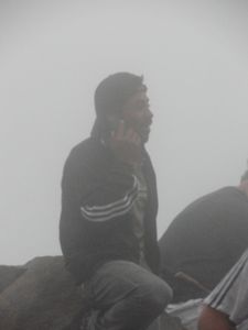 Guatemalan dude on his phone atop Volcan Pacaya