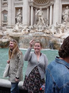 Emma throwing her coin to get love in Rome