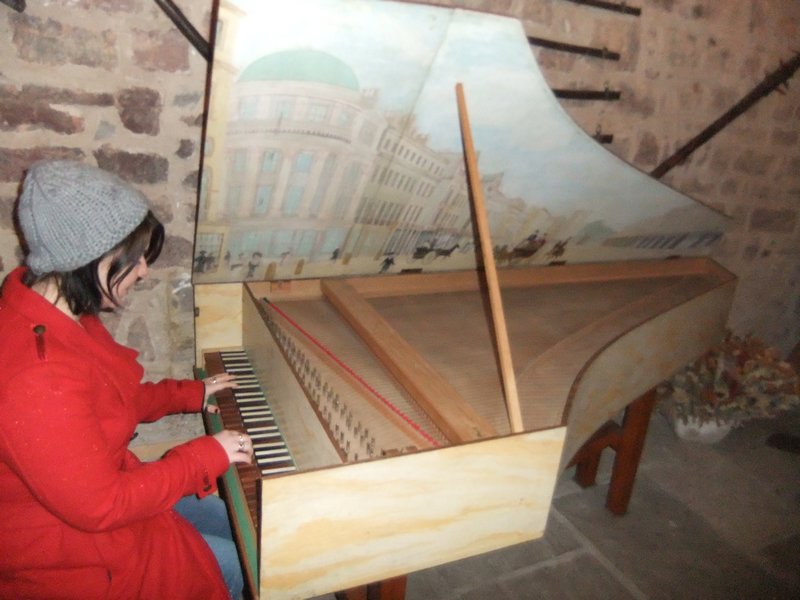 Michelle playing the harpsichord