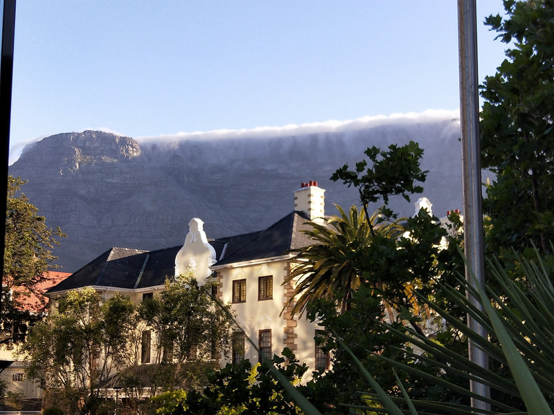 Looking up at table mountain as we walk through Cape Town 