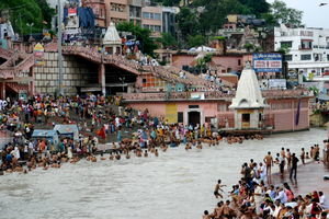 Thousands of pilgrims line the banks of the Ganges