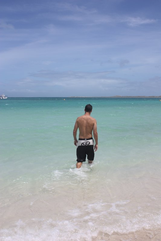 Chris taking a dip at Coral Bay