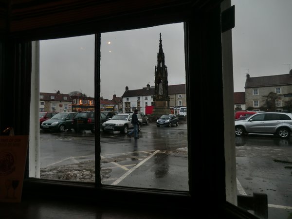 Looking at Helmsley square from inside pub