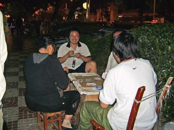 card players at the night market