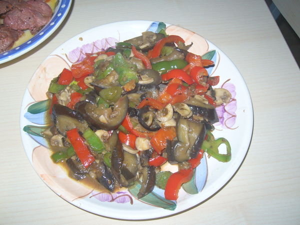 Eggplant with peppers and sauteed garlic