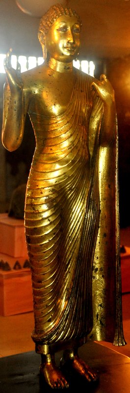Sculpture of a standing Buddha