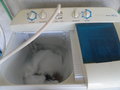 very interesting washing machine...made all of plastic by Sanyo, I would call it semi-automatic