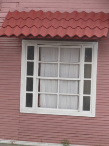 double hung window without iron bars...not the norm here