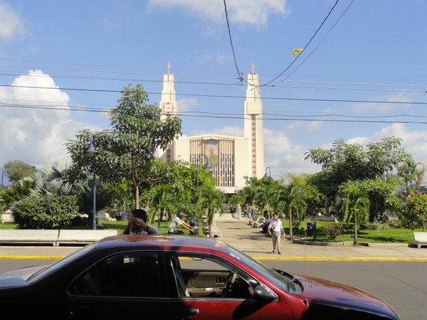 From restaurant looking across street at the Central Park of Isidro & Catholic Church