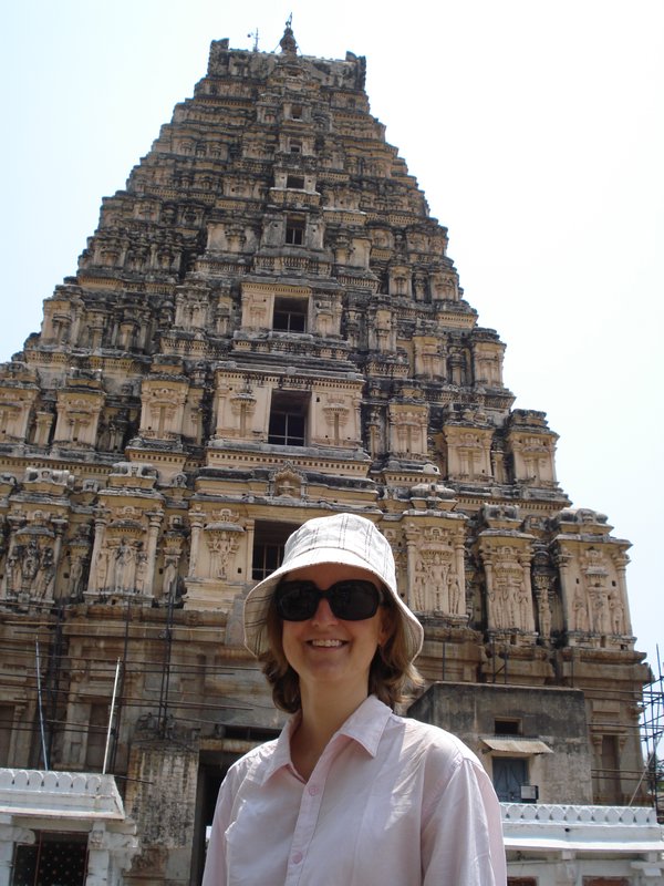 Zoe flanked by a big gopuram
