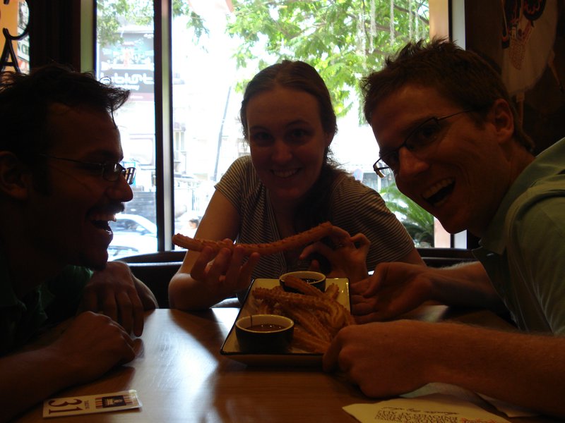 Khaliq, Nez and Brettie eating churros