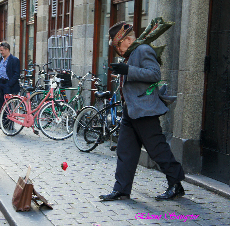 Windswept street performer Amsterdam