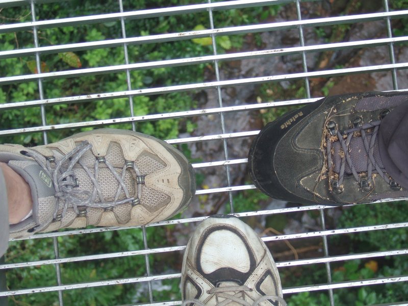 feet on a suspension bridge