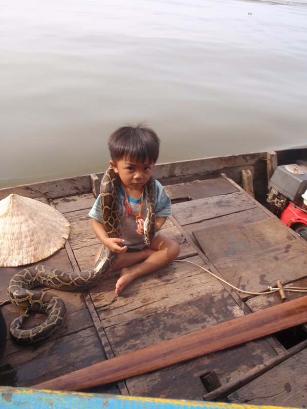 Little guy  with snake