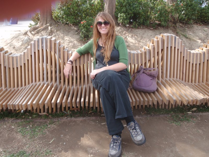 Alexa sitting on cool bench