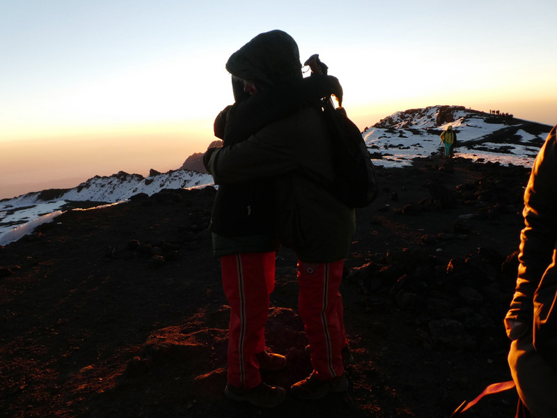 Adam & Pam hugging & emotional from Uhuru Peak 5895m (48)