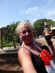 Kerry with beer and Lei