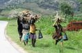 Countryside SE of Antsirabe - villagers walking 11-15km home after markets