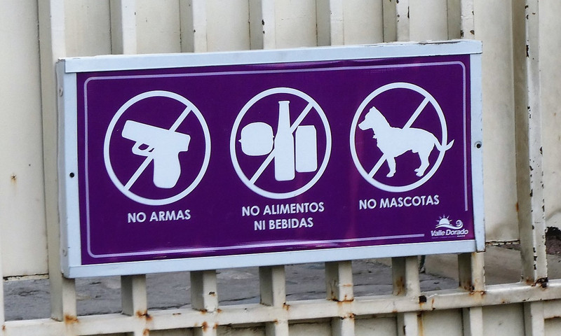 Rio Dulce to Antigua Guatemala - we saw this sign often in restaurants as there are many guns in Guatemala