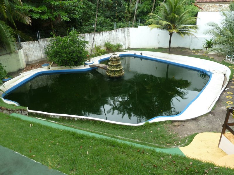 Silvia & Mike Nelson - home in Sao Luis - pond where Tom and AJ caught the fish