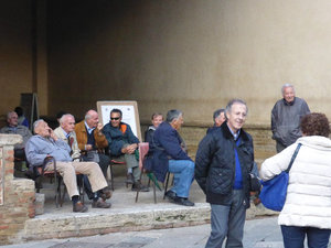 The men of San Gimignano Tuscany Italy 11 Oct 2013