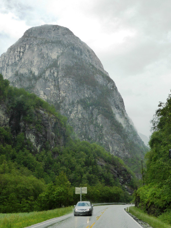 Road from Voss to Flam - many waterfalls and raging rivers in between tall mountains (1)