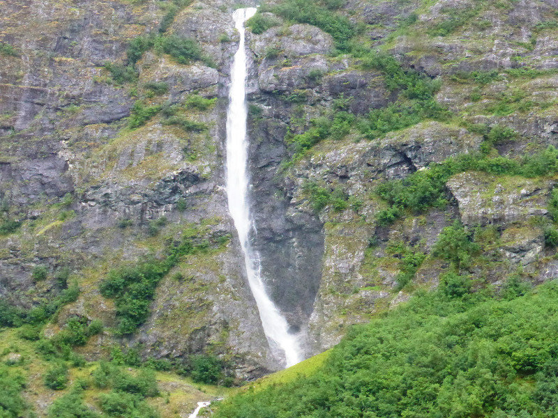 Road from Voss to Flam - many waterfalls and raging rivers in between tall mountains (4)
