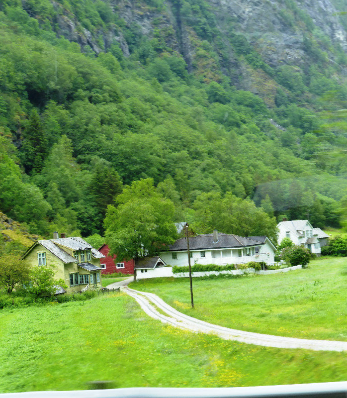 Road from Voss to Flam - many waterfalls and raging rivers in between tall mountains (13)