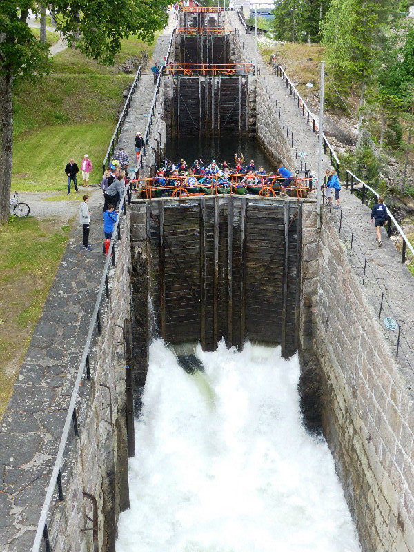 Canoes going throughTelemark Canal sluice gates (1)
