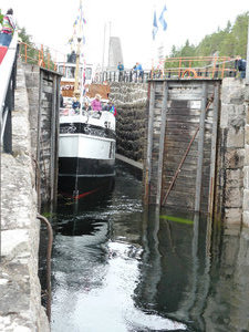 Cruise boat going through Telemark Canal sluice gates (1)