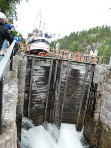 Cruise boat going through Telemark Canal sluice gates (2)